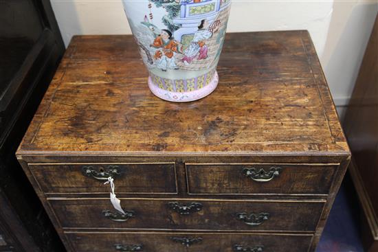 A George III feather banded fruitwood chest W.2ft 5in. D.1ft 8in. H.2ft 9in.